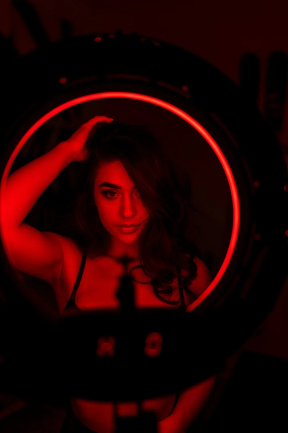 Model in a ring light representing live and digital opportunities
