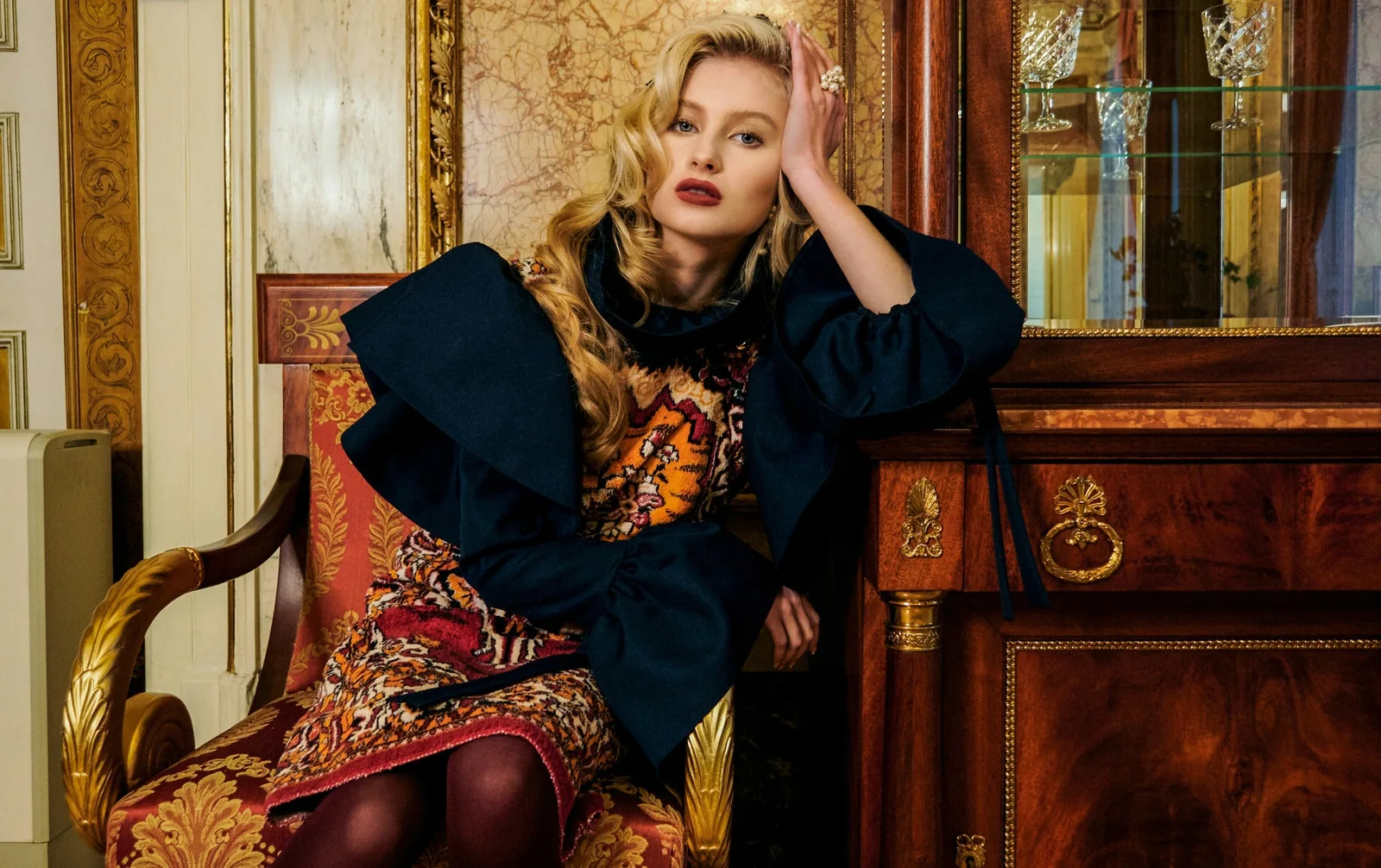 Elegant model in an ornate interior representing Angels of P Model Management